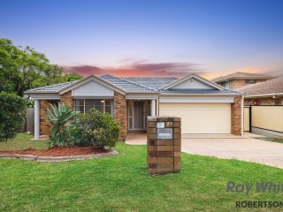 MODERNIZED LOWSET BRICK HOME IN A PERFECT LOCATION!
